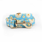 Mona & Milo Daisy Days dog collar and leash set with floral pattern and adjustable straps for small to medium pets.