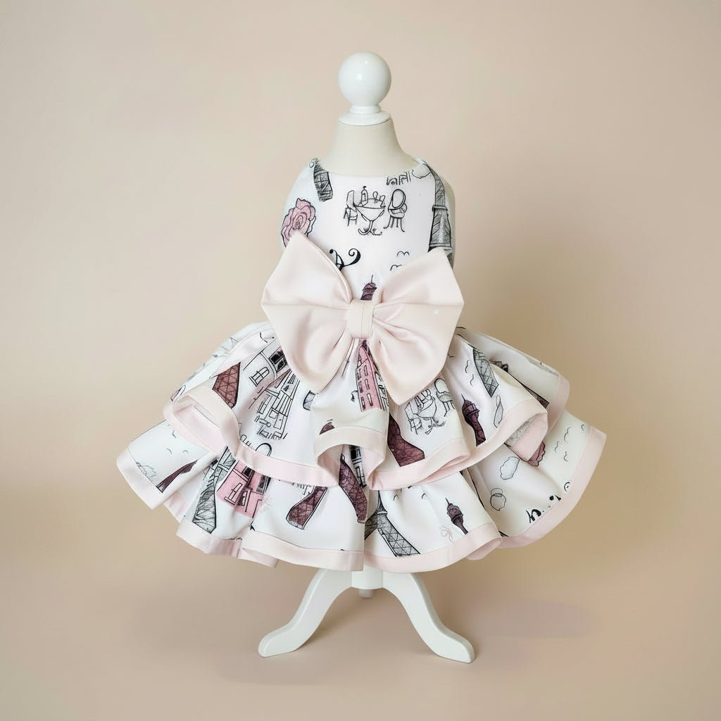 Mona & Milo The Petit Paris Dress featuring a stylish, lightweight fabric with floral patterns and a classic fit.
