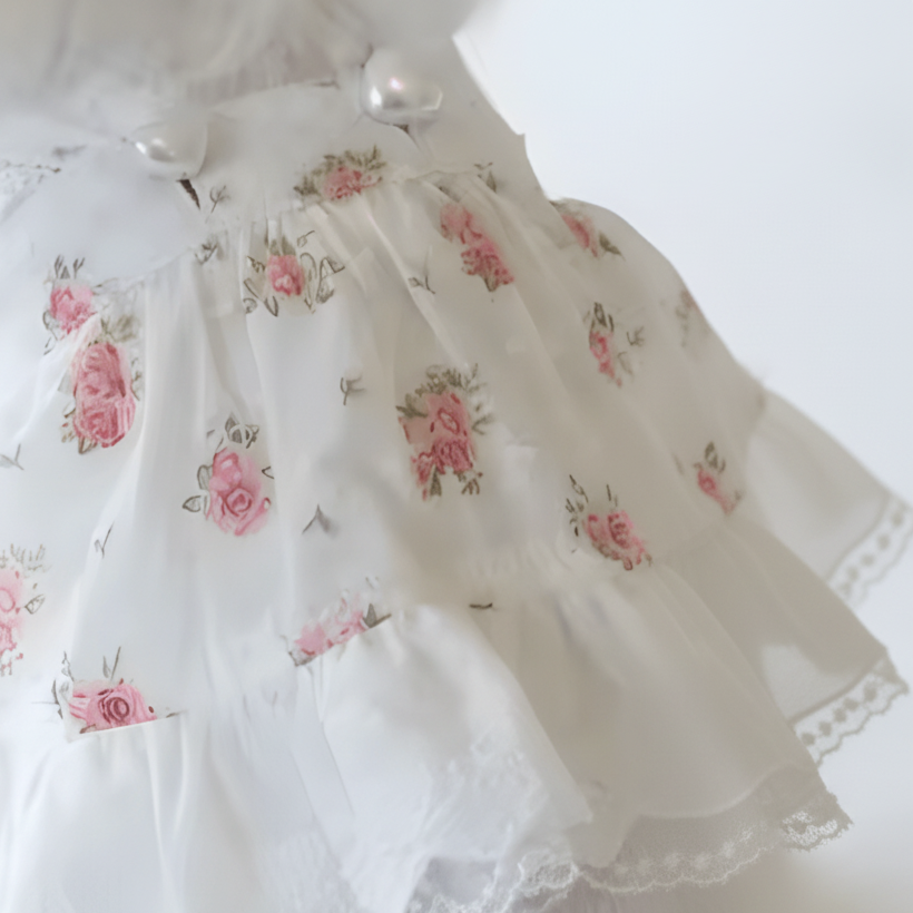 Mona & Milo Lola Cotton Floral Dress featuring a lightweight fabric with a colorful floral pattern and a relaxed fit.