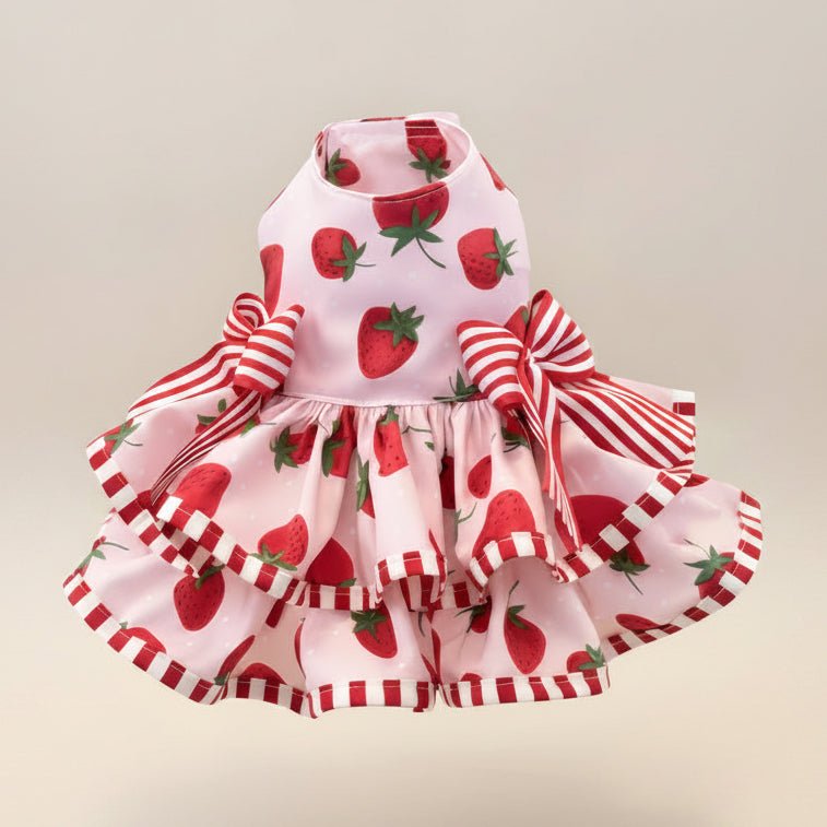 Mona & Milo The Berry Daydream Dress displayed on a hanger, featuring a floral pattern and flowing fabric.