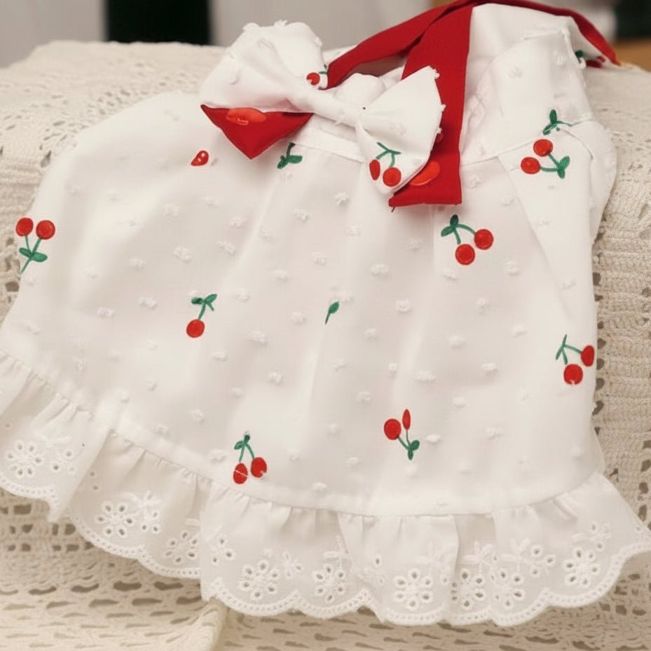 Cherry Twist Cotton Dress by Mona & Milo, lightweight dress with a vibrant cherry pattern and relaxed fit.