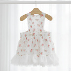 Mona & Milo Lola Cotton Floral Dress featuring a lightweight fabric with a vibrant floral pattern and sleeveless design.