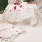 Cherry Twist Cotton Dress by Mona & Milo featuring a playful cherry print and a casual, comfortable fit.