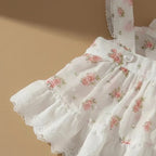 Mona & Milo Lola cotton floral dress with a vibrant, colorful floral pattern and a comfortable, breezy fit for warm weather.