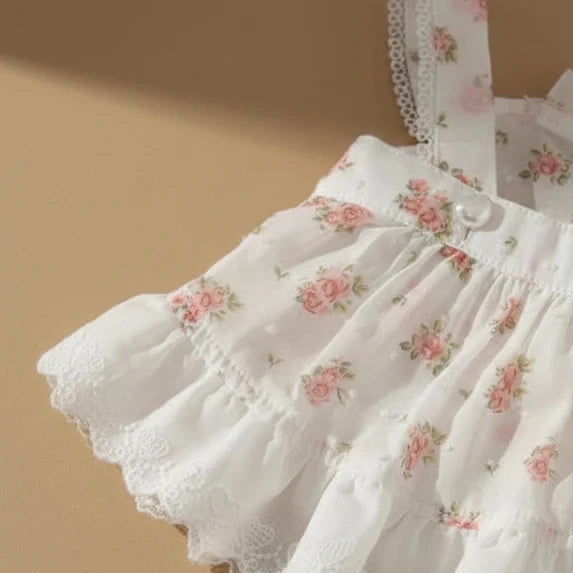 Mona & Milo Lola cotton floral dress with a vibrant, colorful floral pattern and a comfortable, breezy fit for warm weather.