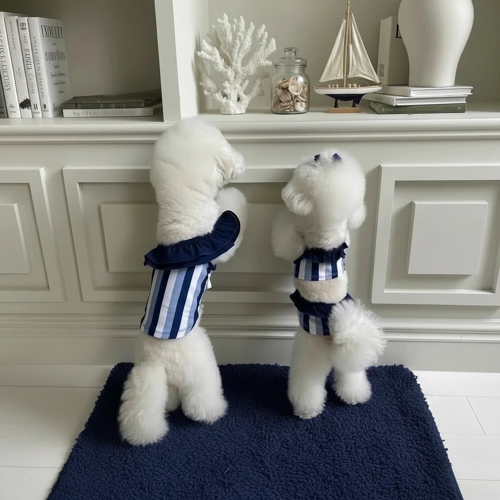 Mona & Milo Nautique striped swimsuit, stylish swimwear with bold horizontal blue and white stripes.
