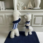 Mona & Milo Nautique striped swimsuit, stylish swimwear with bold horizontal blue and white stripes.