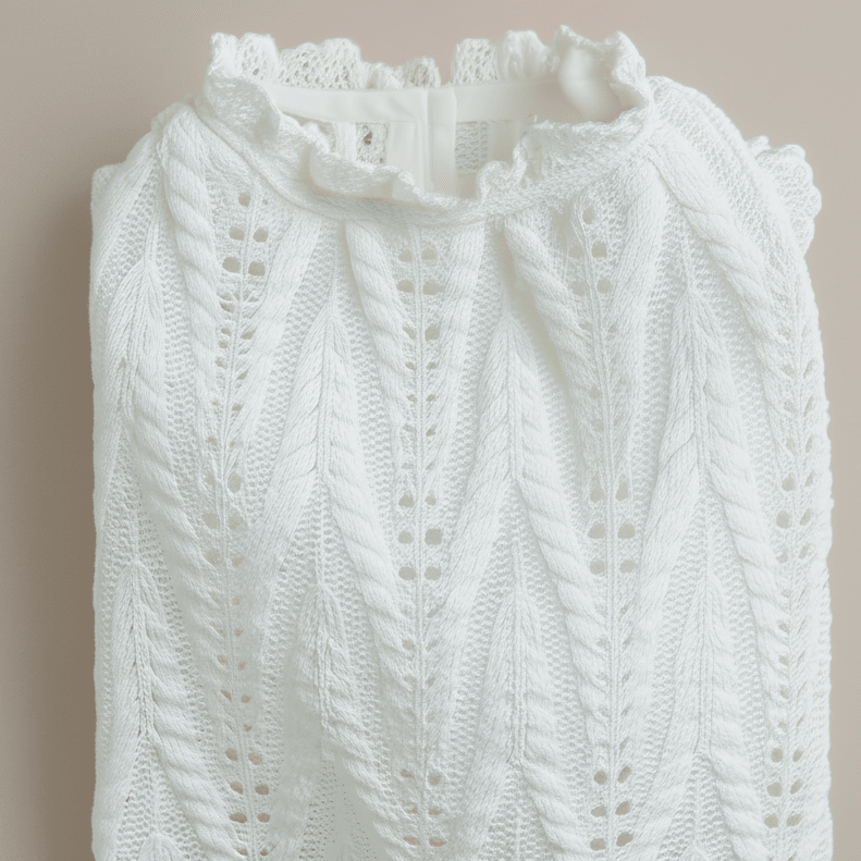Mona & Milo Crestknit cotton top featuring a relaxed fit and soft fabric, ideal for casual wear.