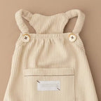 Mona & Milo butterscotch corduroy pinafore dress with adjustable straps and front pocket, casual and cozy for girls.
