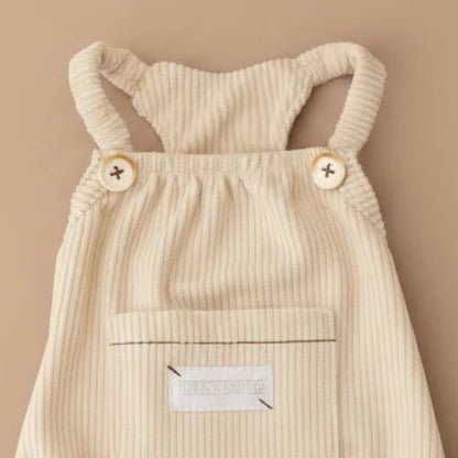 Mona & Milo butterscotch corduroy pinafore dress with adjustable straps and front pocket, casual and cozy for girls.