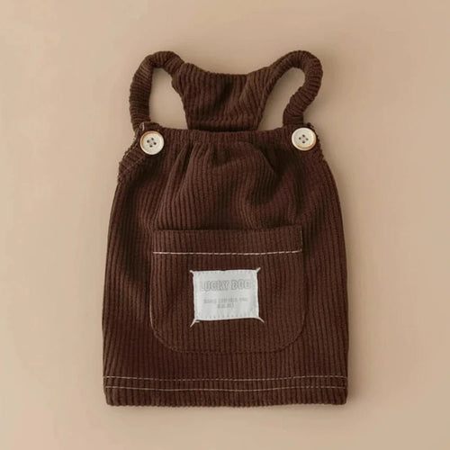 Butterscotch corduroy pinafore dress by Mona & Milo, featuring a charming sleeveless design