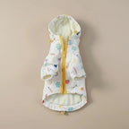 Mona & Milo Raindance fleece-lined raincoat for women, navy blue, with hood and front pockets, suitable for rainy weather.