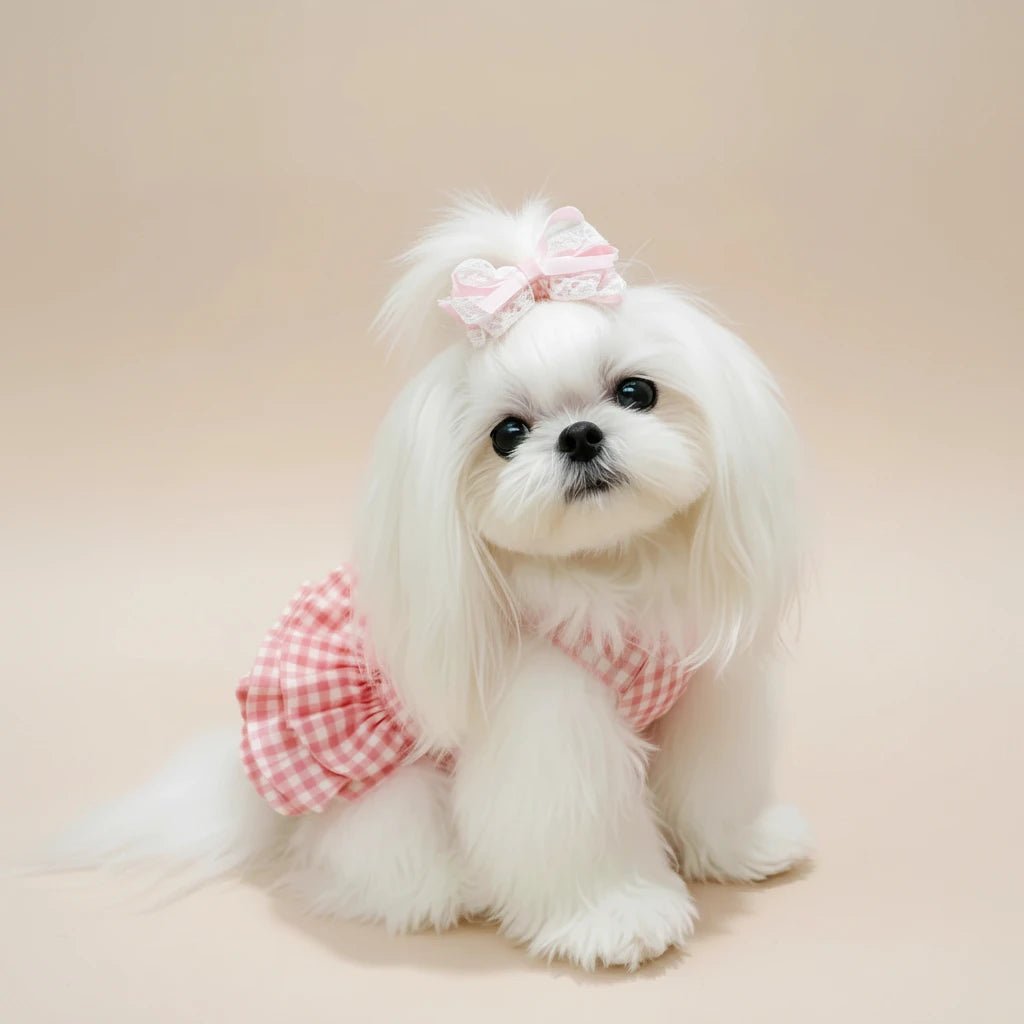 Mona & Milo Rosette Cotton Gingham Dress featuring a classic checkered pattern and sleeveless design for girls.