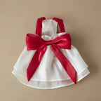 Mona & Milo Giselle Bow Dress in soft fabric with a bow detail, perfect for stylish occasions and comfortable wear.