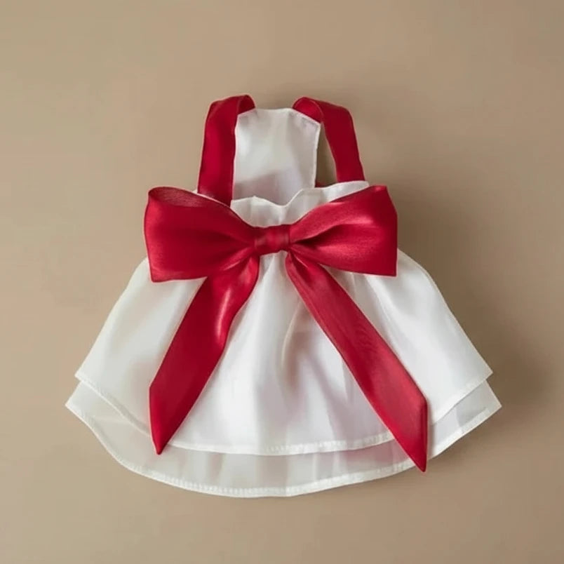 Mona & Milo Giselle Bow Dress in soft fabric with a bow detail, perfect for stylish occasions and comfortable wear.