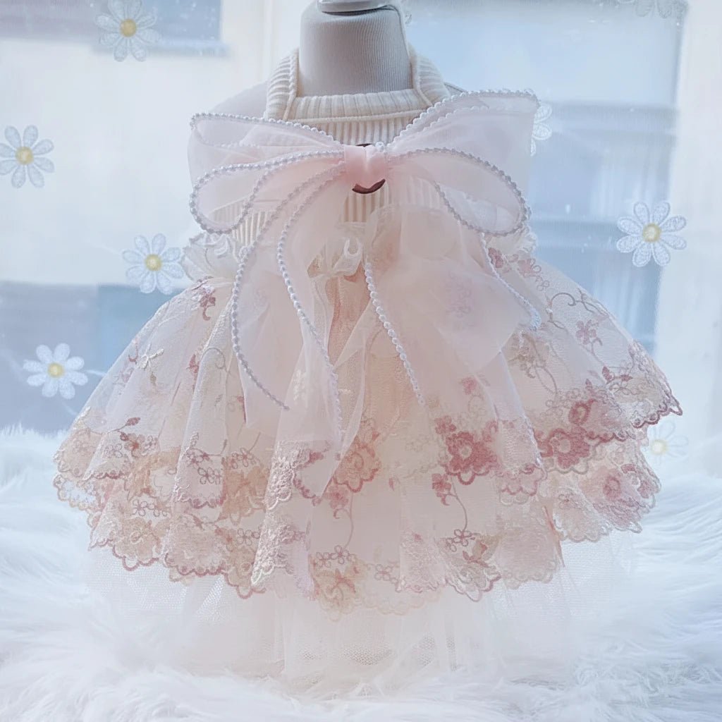 Mona & Milo Seraphine Tulle Dress featuring a delicate, layered tulle fabric with a flowing silhouette and elegant design.