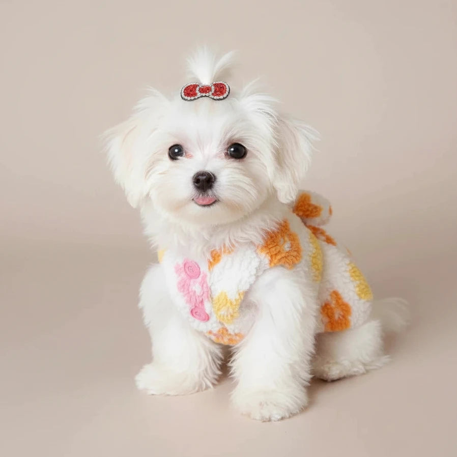 Mona & Milo Calypso Floral Fleece Dress showing a cozy, floral-patterned dress with long sleeves and a relaxed fit.