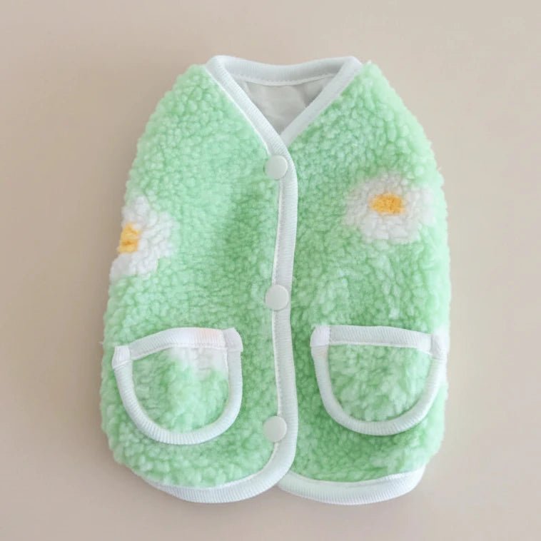 Mona & Milo Seraphine Floral Fleece Vest with colorful floral pattern and soft fleece material on a hanger.
