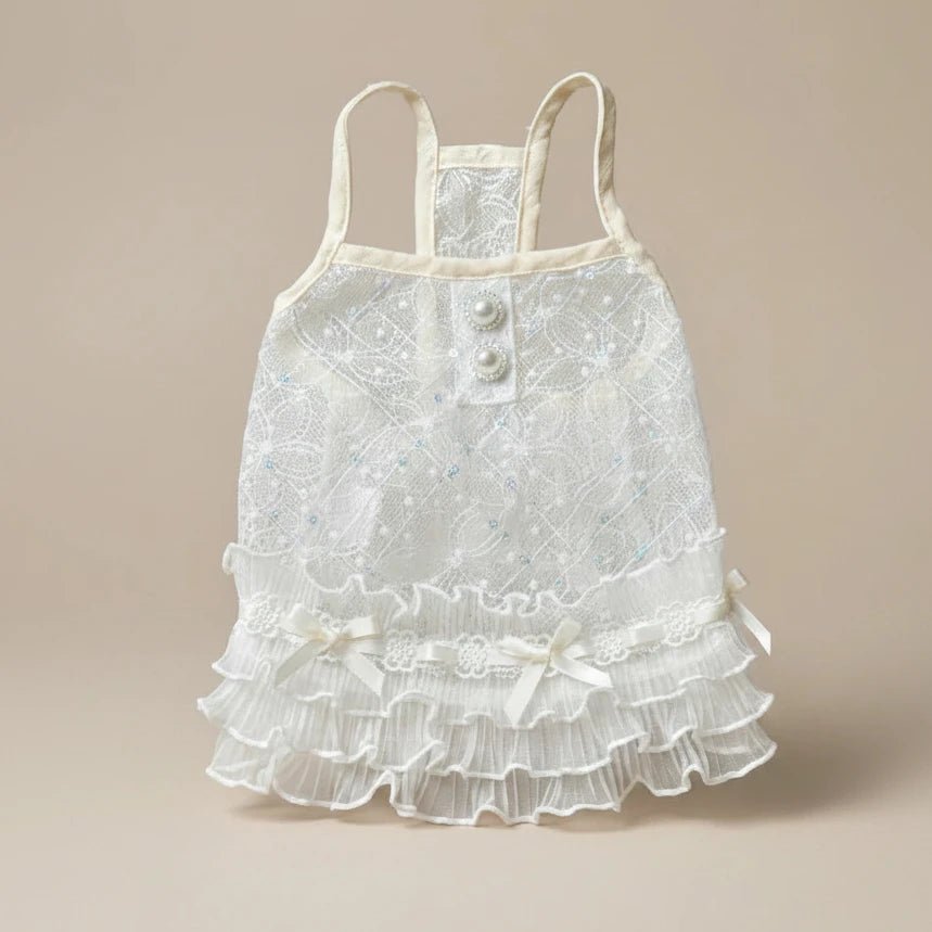 Mona & Milo Bella Lace Dress featuring intricate lace fabric and elegant design