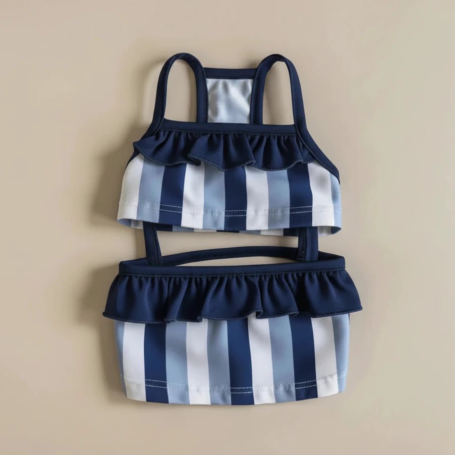 Mona & Milo Nautique striped swimsuit for women, featuring a stylish blue and white pattern