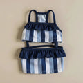 Mona & Milo Nautique striped swimsuit for women, featuring a stylish blue and white pattern