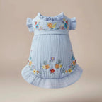 Mona & Milo Soleil floral embroidered dress featuring vibrant floral patterns and delicate embroidery on lightweight fabric.