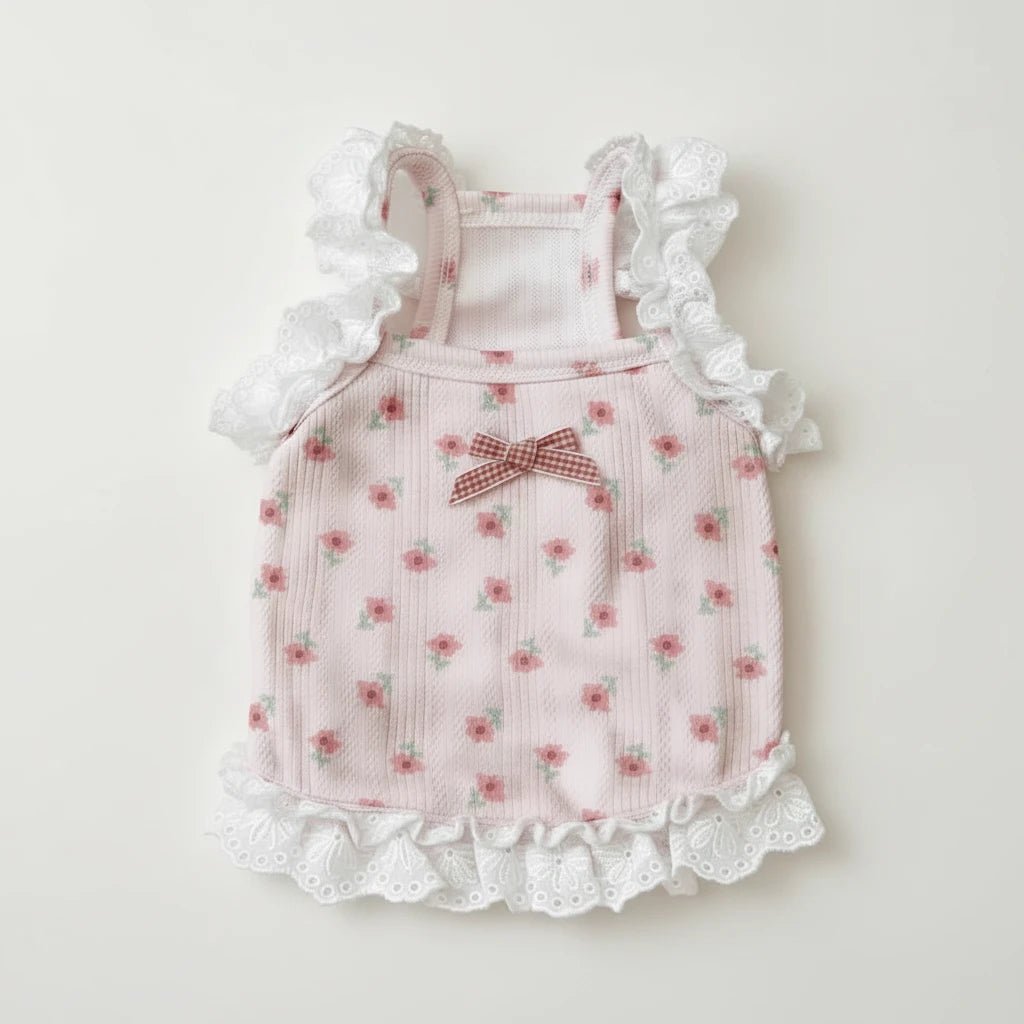 Mona & Milo Lottie Broderie Anglaise sleeveless top with intricate embroidery and scalloped edges, displayed on a hanger.