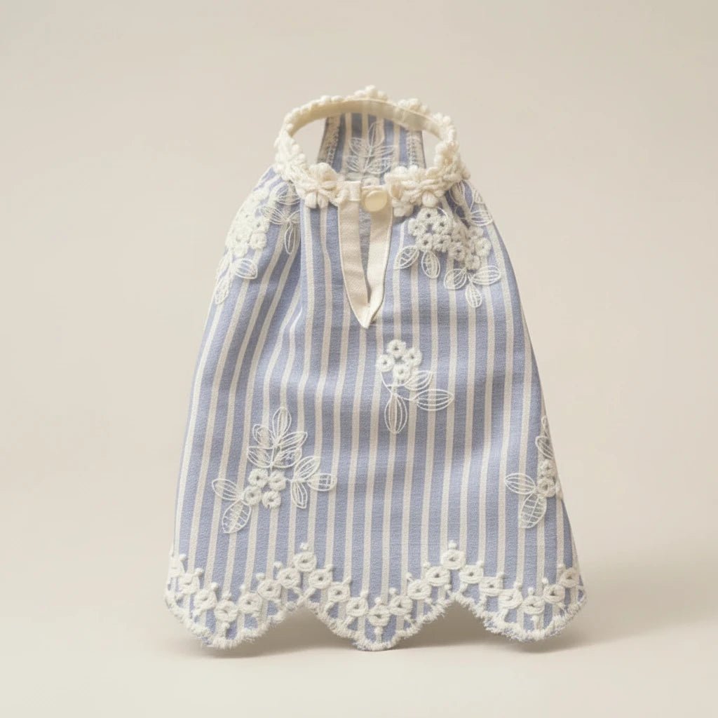 Mona & Milo Elara embroidered dress featuring intricate floral embroidery and a flowing fabric