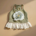 Florence Cotton Flower Dress by Mona & Milo featuring a vibrant floral pattern and lightweight fabric