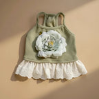 Florence Cotton Flower Dress by Mona & Milo featuring a vibrant floral pattern and lightweight fabric