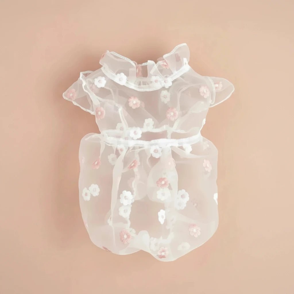 Mona & Milo Daisy Sheer Dress in lightweight, flowy fabric with floral pattern, perfect for summer or casual occasions.