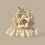 Florence Cotton Flower Dress by Mona & Milo featuring a floral pattern, sleeveless design, and lightweight cotton fabric.