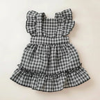 Black and white checkered dog dress with ruffled details 