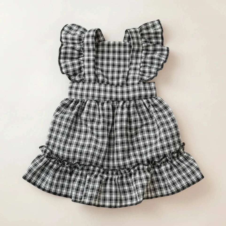 Black and white checkered dog dress with ruffled details 