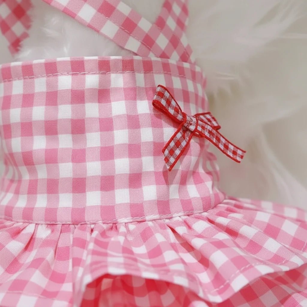 Mona & Milo Rosette Cotton Gingham Dress shown on a hanger with a classic red and white checkered pattern.