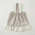 Fern & Rue cotton dress by Mona & Milo featuring a flowy, lightweight design with floral patterns and short sleeves.